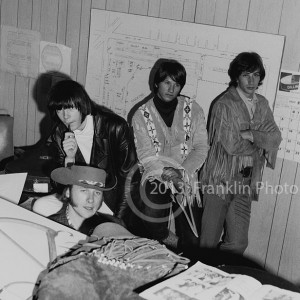 Buffalo Springfield band members (except drummer Dewey Martin) on 4-26-68  in one of the offices under the grandstand at the Fairgrounds  in Phoenix Arizona. Photo by Tom Franklin