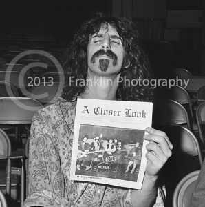 Frank Zappa with a copy of A Closer Look magazine. Photo by John Franklin. Tom's pictures of Frank have been lost. Only this one remains. Hopefully more will be found in the future. 