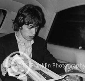 8685 Mick Jagger in the limo on the way to the concert. Photo by Tom Franklin.