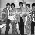 8853 The Standells posing for a photo backstage and holding A Closer Look Magazine. Photo by Johnny Franklin.